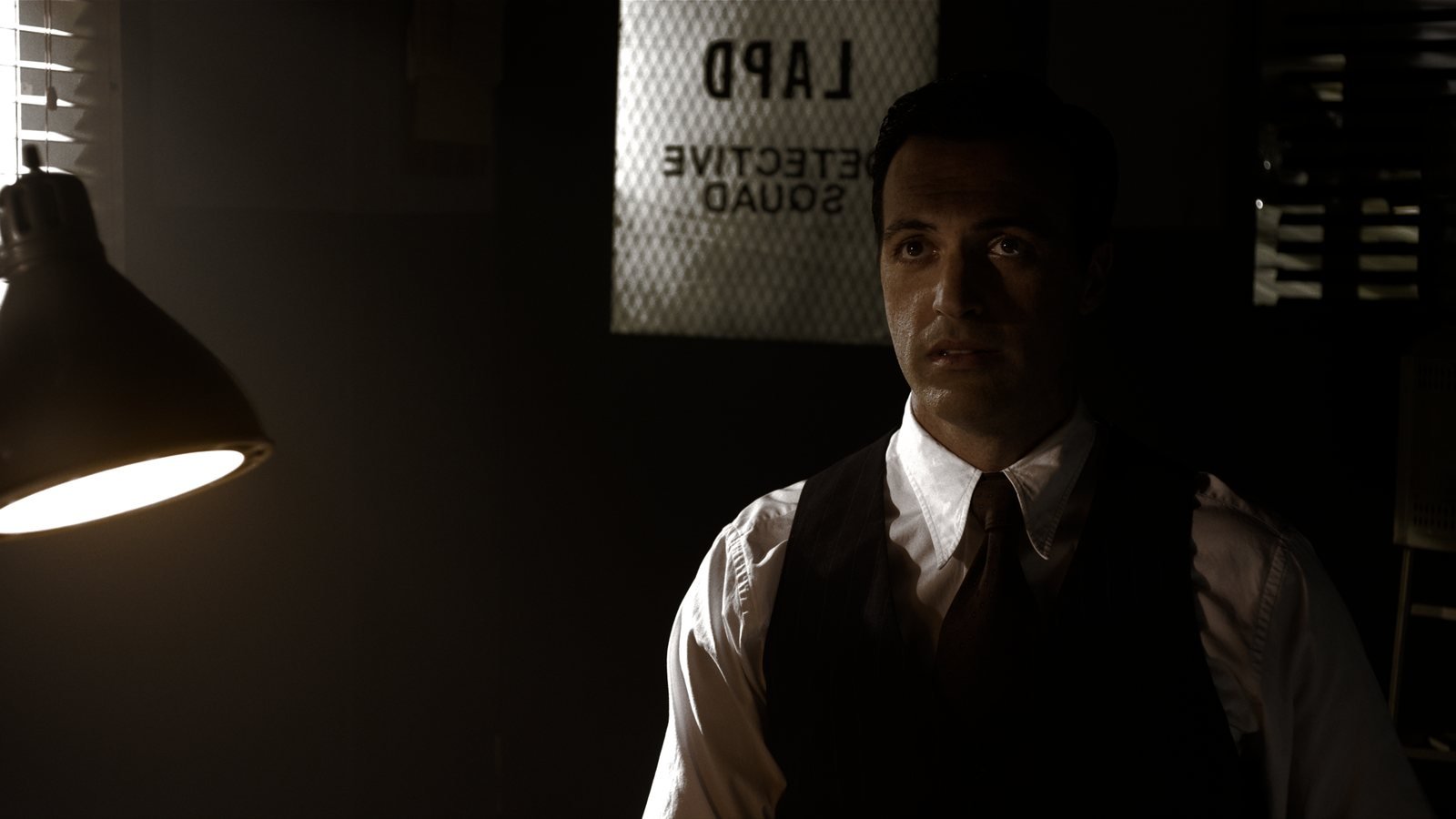 A scene from Meridian graded for standard range, with the lamp-lit detail flattened